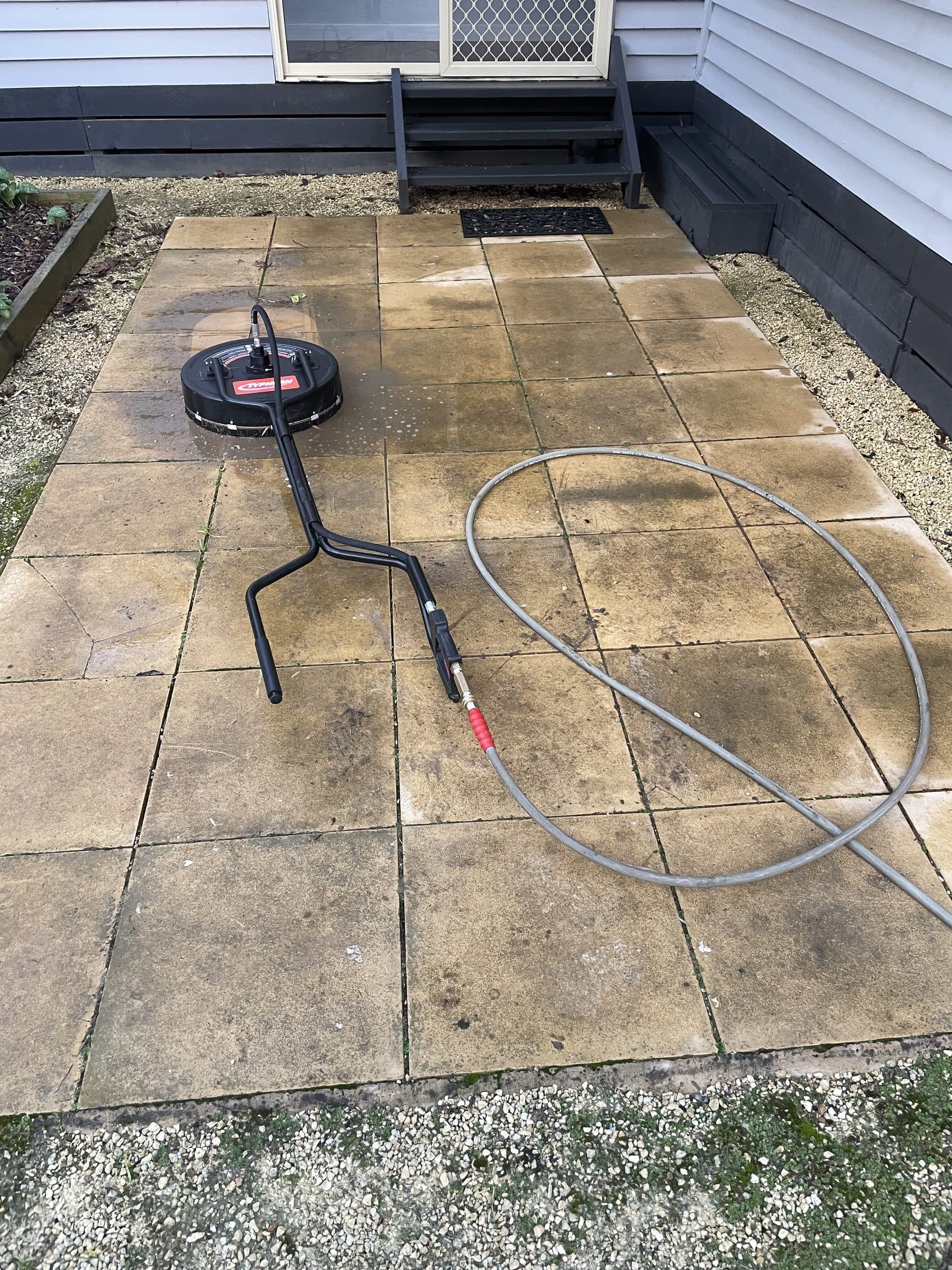 Driveway before high-pressure cleaning